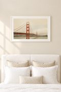 A photographic print of the iconic Golden Gate Bridge covered in mist on a foggy summer morning.