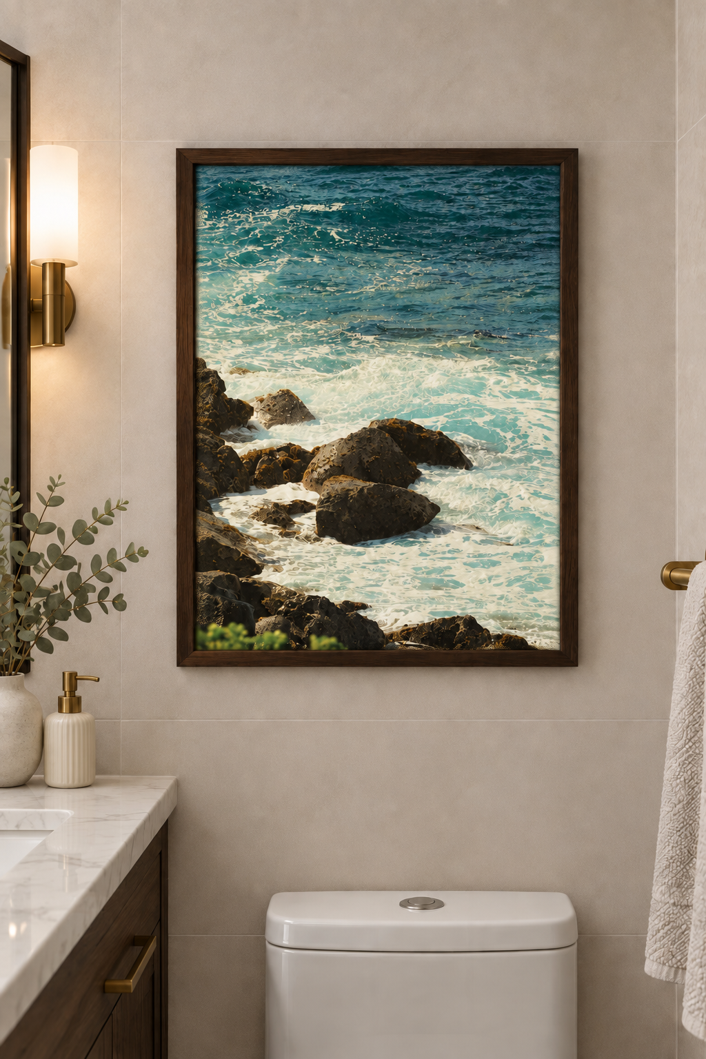 Foamy waves and coastal rocks print without a white border in a dark wooden frame on a bathroom wall